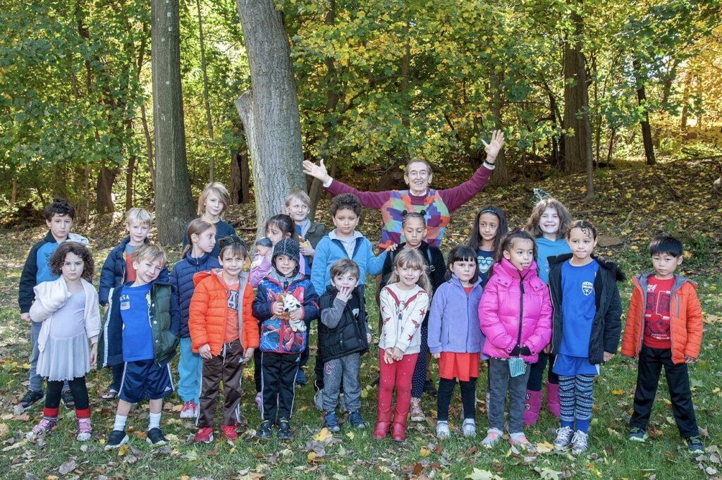 Bob Mcgrath, The former Sesame Street actor and Teaneck resident poses with a group of children at the Teaneck International Film Festival. Ray Turkin photography