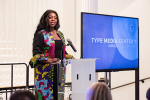 Lucille Wenegieme, Executive Director of Headcount accepting The Puffin Prize for Creative Citizenship
