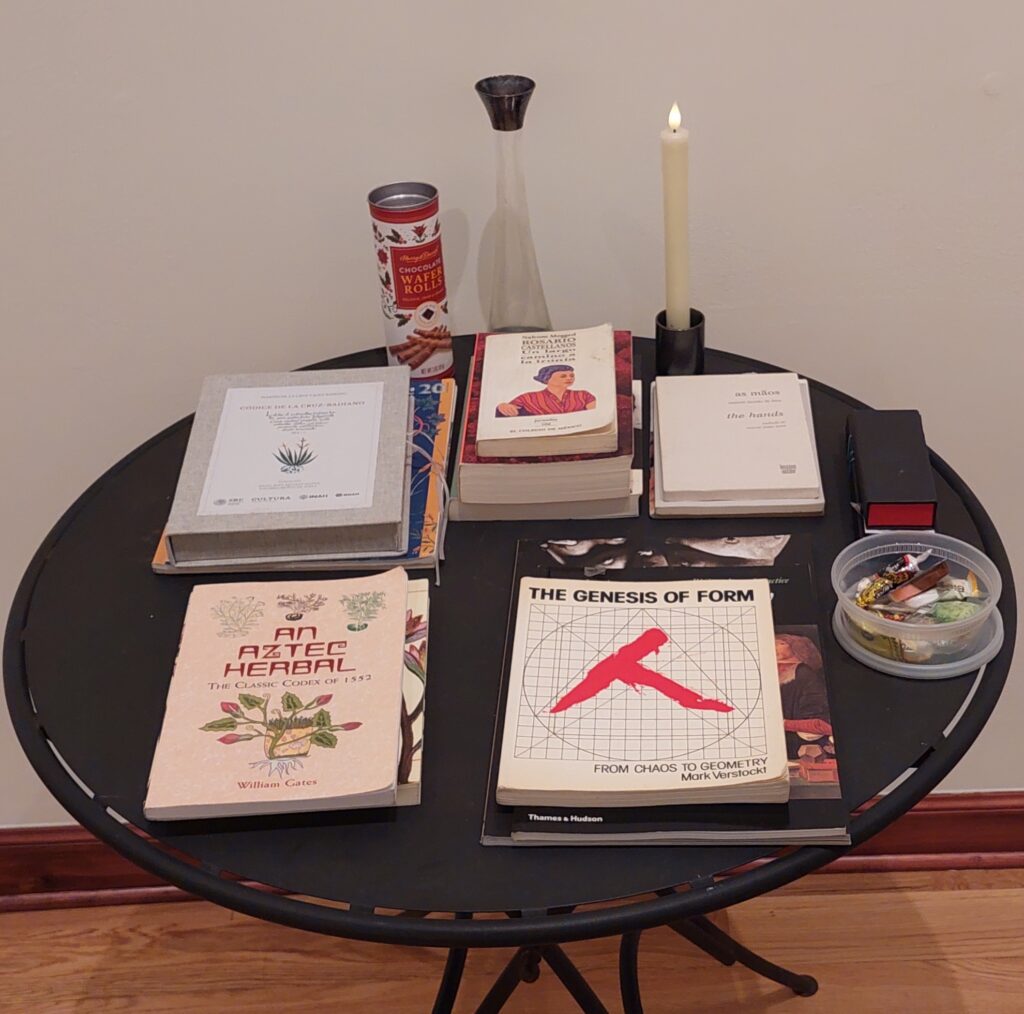 a collection of art books on a round table